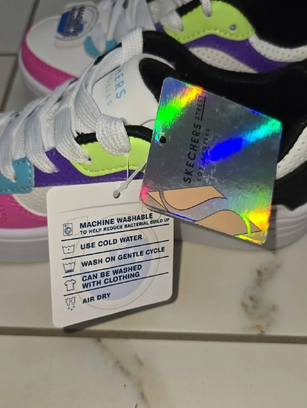 Skechers White Sneakers with Pink, Purple, Blue & Lime Accents